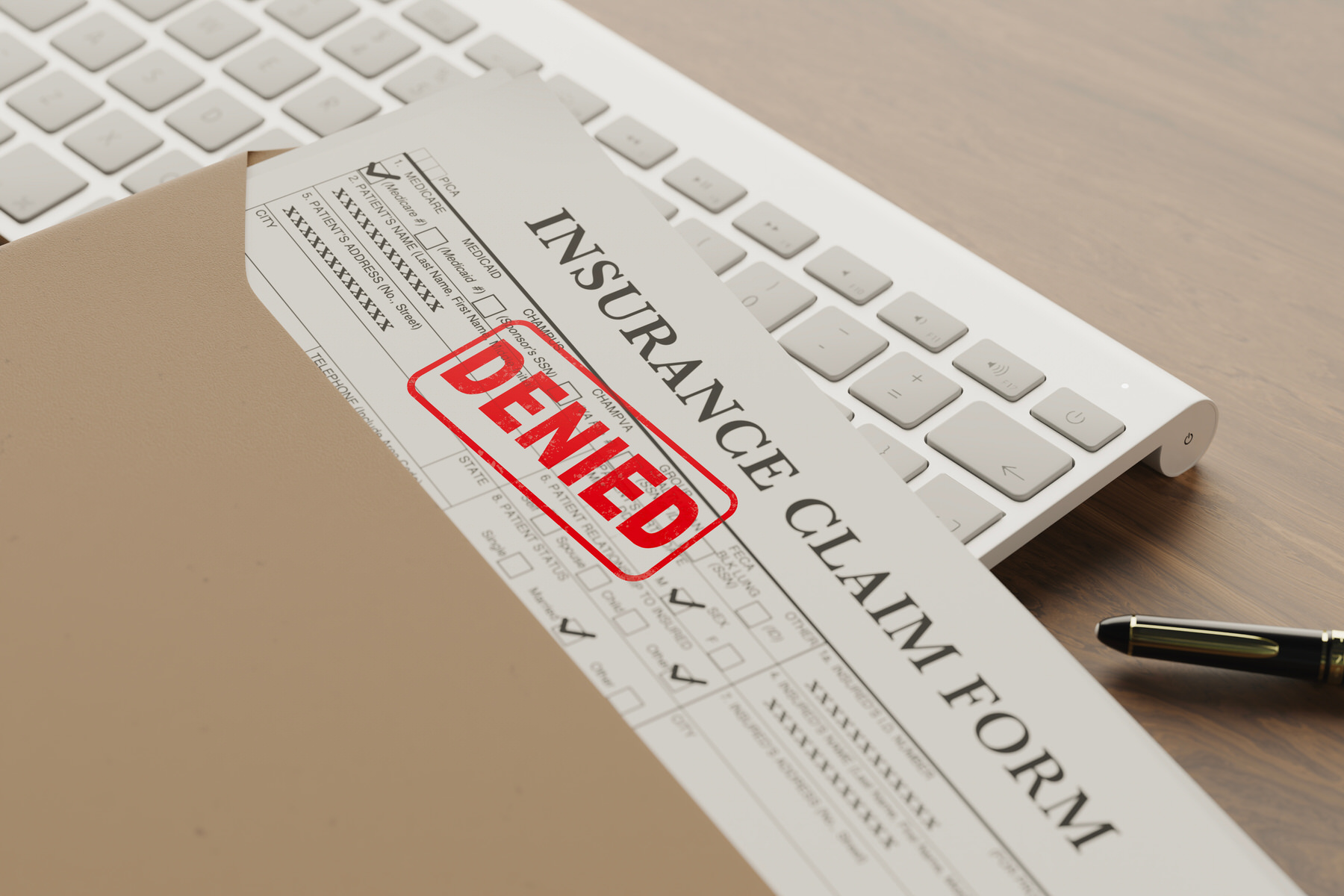 Insurance Claim form with denied stamp